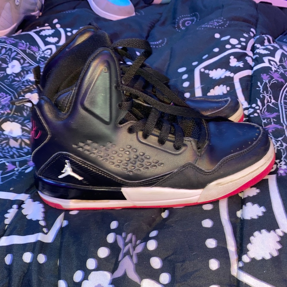 Black and pink Jordan’s